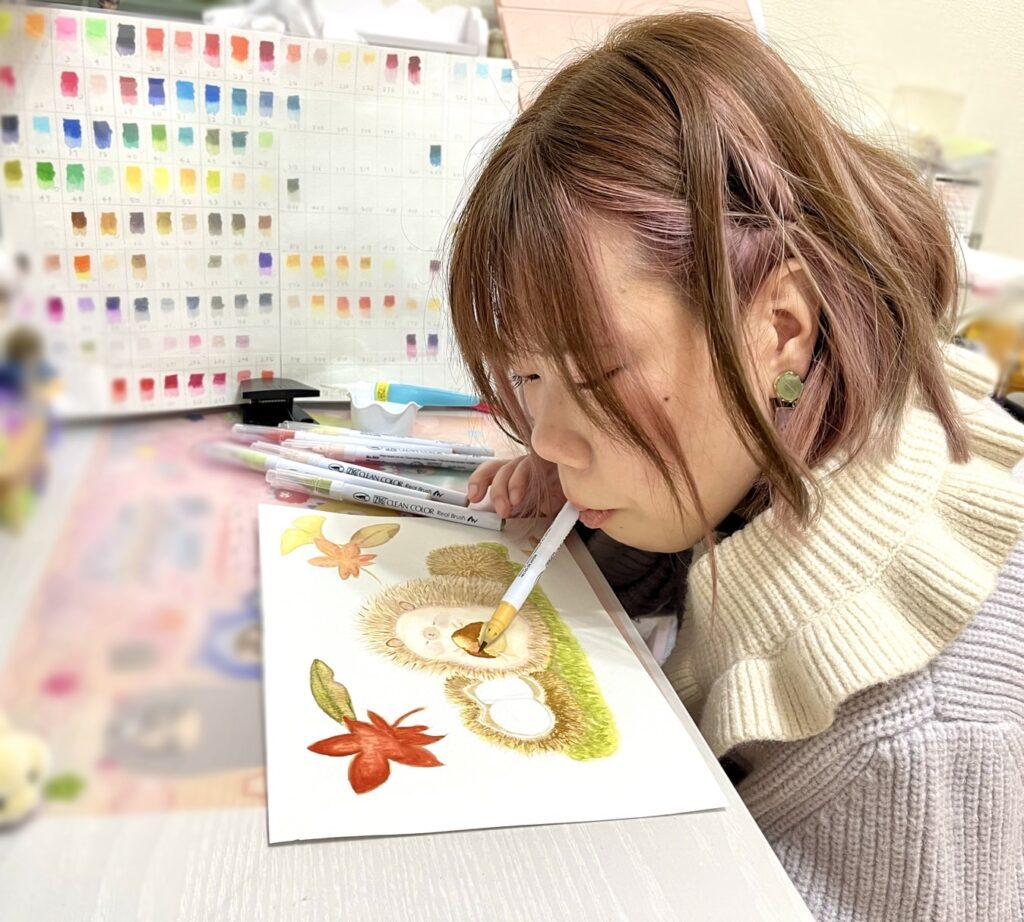 実際に絵を書いている様子（ご本人より提供）