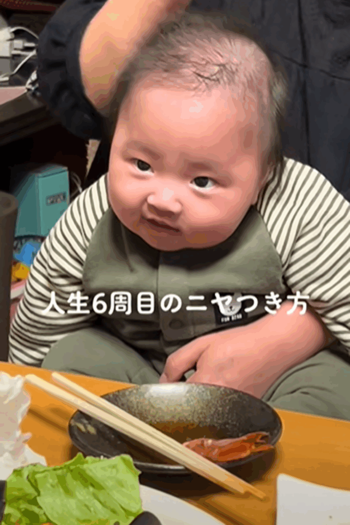 貫禄のある表情でニヤリとする息子さん（@gdyyddtuさんより提供）