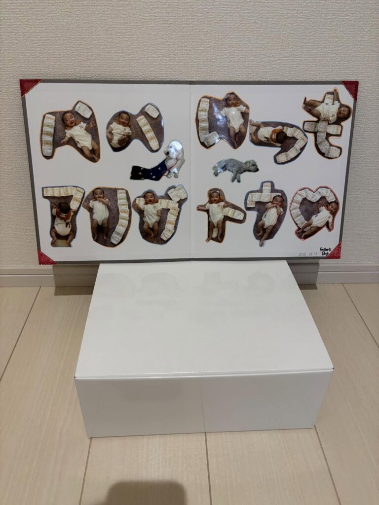 オムツアートによるメッセージ「パパいつもありがとう♡」①（@o__sushi723さんより提供）