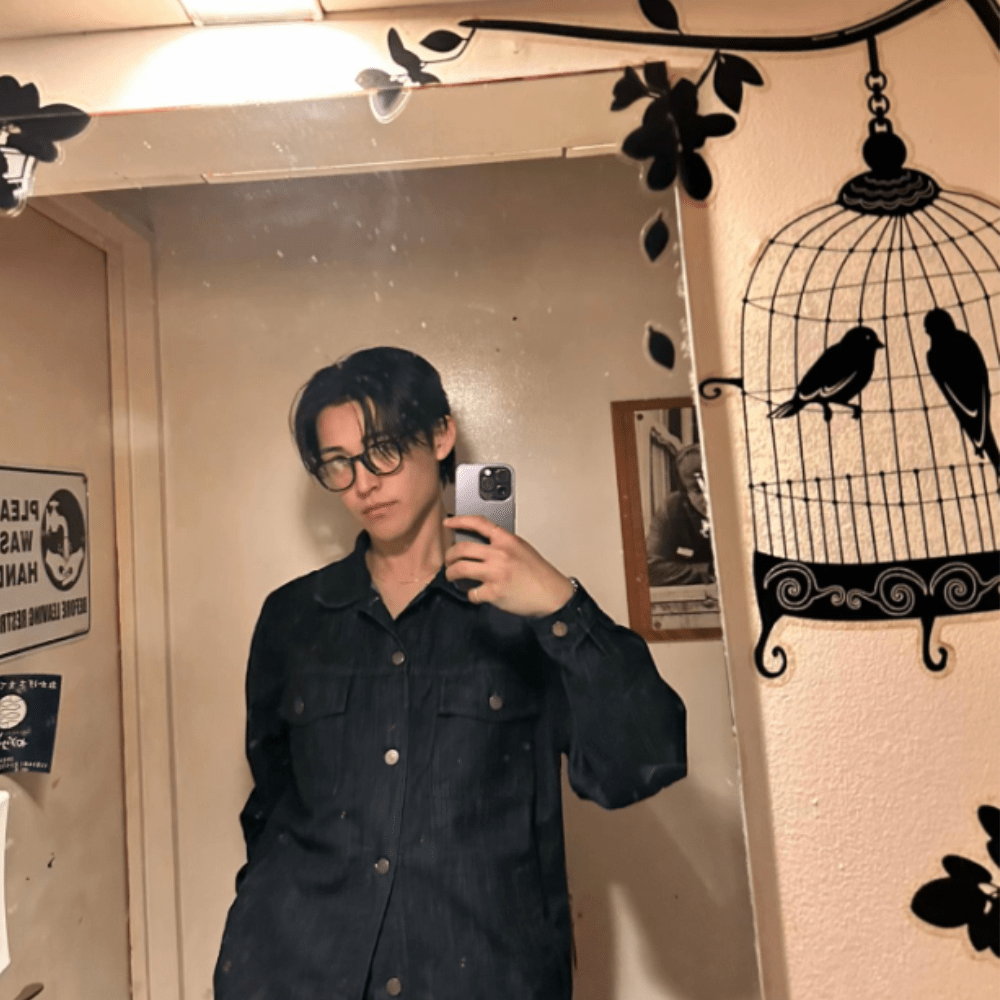 鏡越しに写真を撮る様子（genyu_307さんより提供）