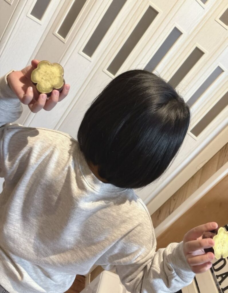 サツマイモと娘さん（＠kiiroitori0175Hさんより提供）