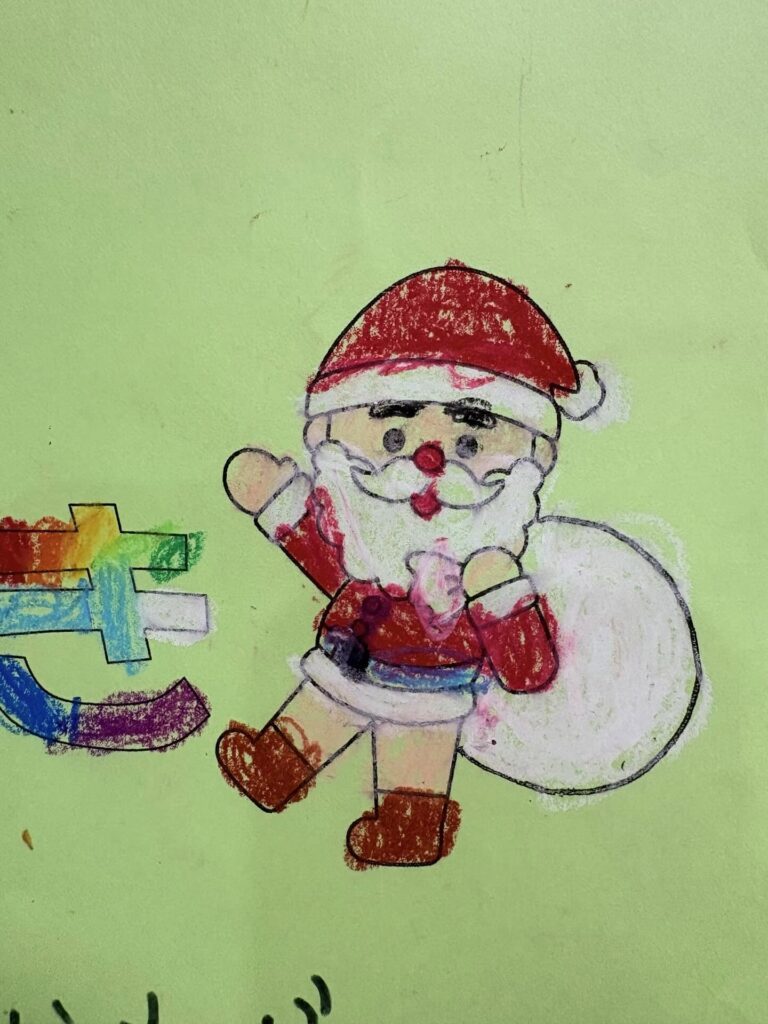 娘さんが塗ったサンタクロース（＠sanaechan0418さんより提供）