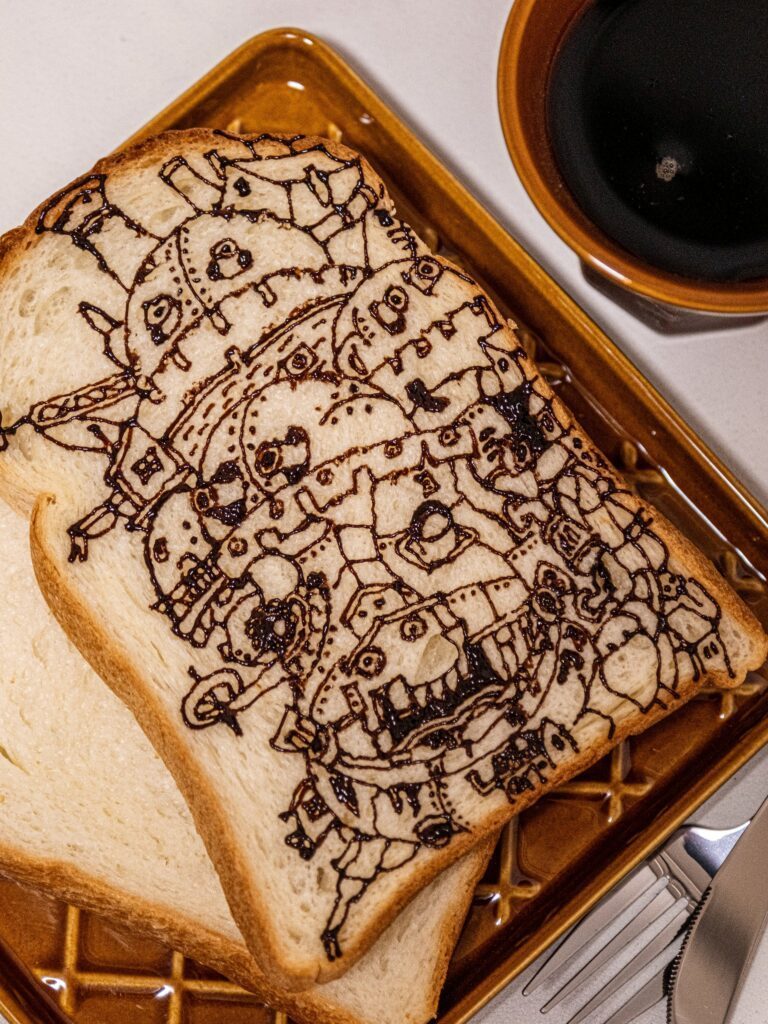 チョコペンで描かれた「ハウルの動く城」（＠kenta_sucretierさんより提供）